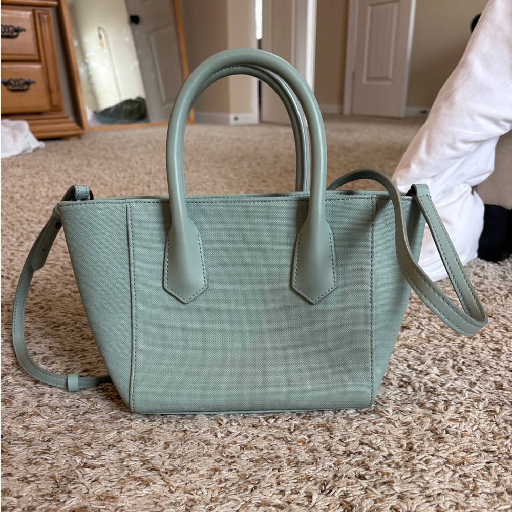 Dagne Dover top handle leather bag petite signature tote in a mint green-blue